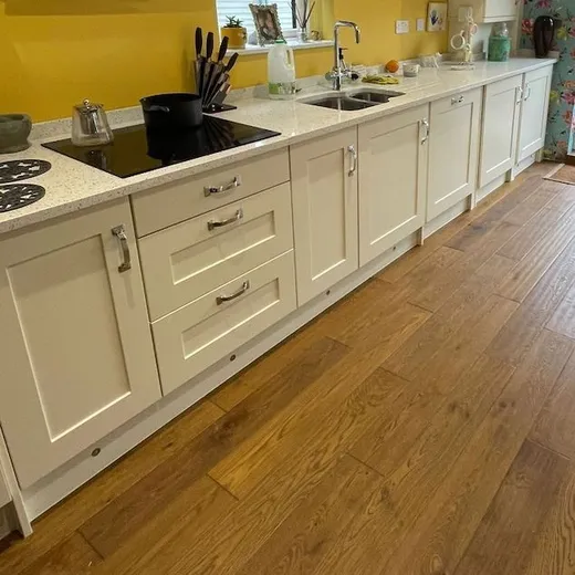 Completed fitted kitchen with worktops and cupboards